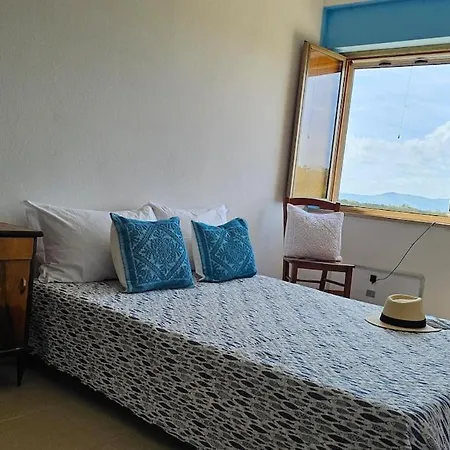 Сasa de vacaciones Acquamarina House By The Sea Badesi